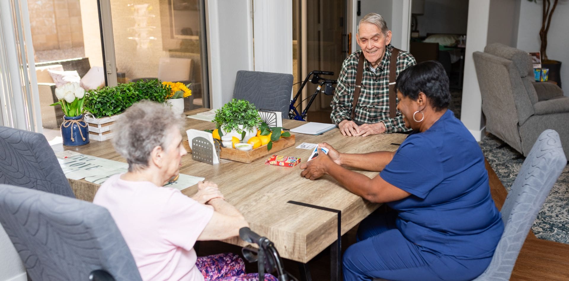 A group of people sitting around a table.